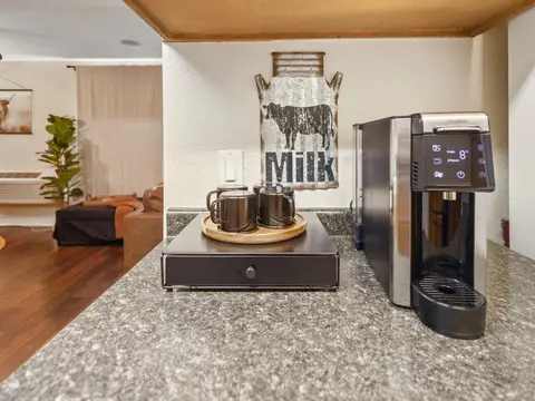 Coffee station with a coffee maker and mugs