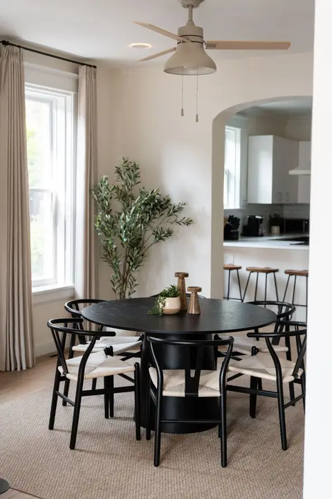 Dining area with seating for six, open to the kitchen