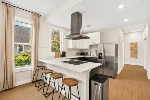 Kitchen with island seating for four