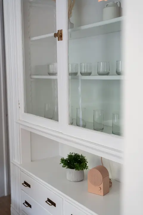 Original built-in cabinetry with glassware