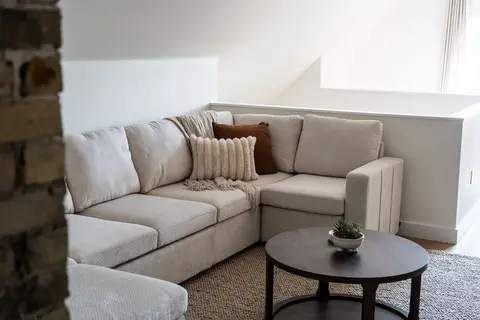 Sectional seating in the upper-level lounge