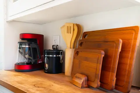 Coffee maker, grounds canister, and the cutting board set