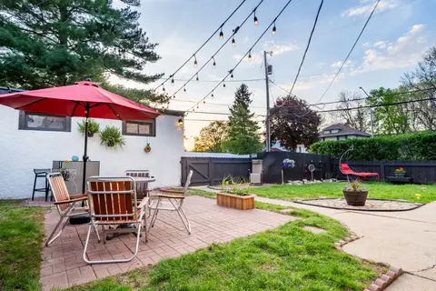 The fenced common yard, looking across the patio