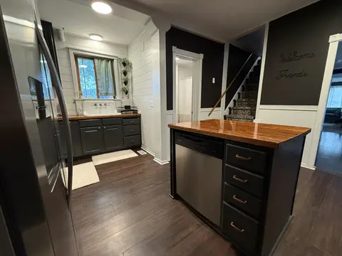 Kitchen with an island and a dishwasher