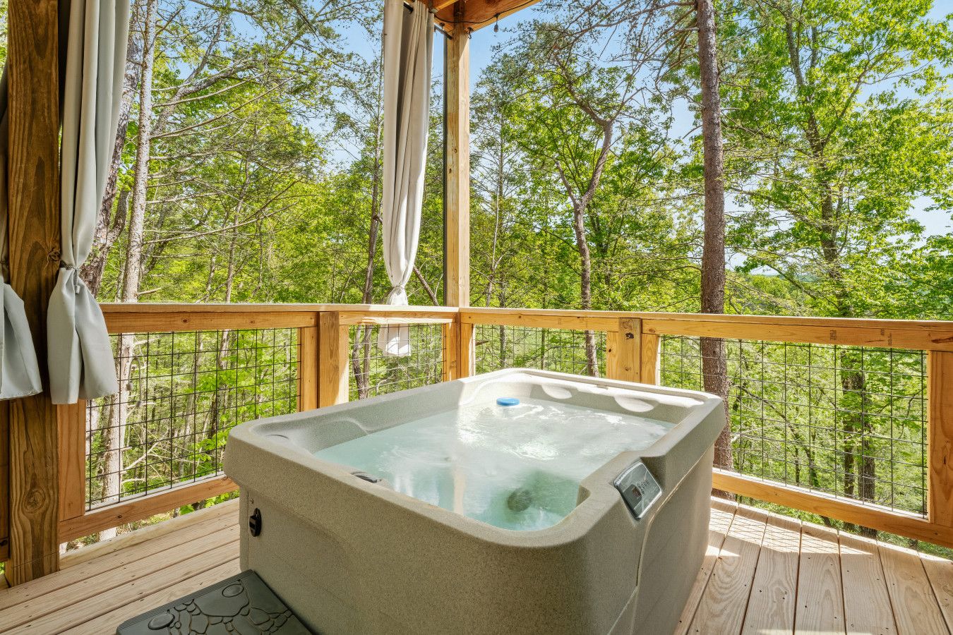 Reconnect with nature while soaking in your cozy hot tub.