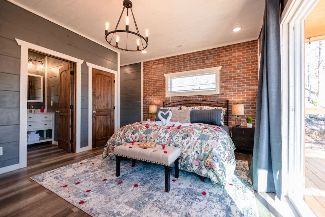 Escape to a cabin where the master bedroom sets the scene for romance and unforgettable moments.