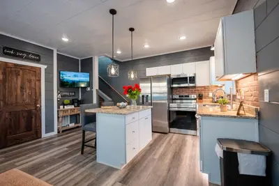 Fully equipped kitchen with a full HDTV.