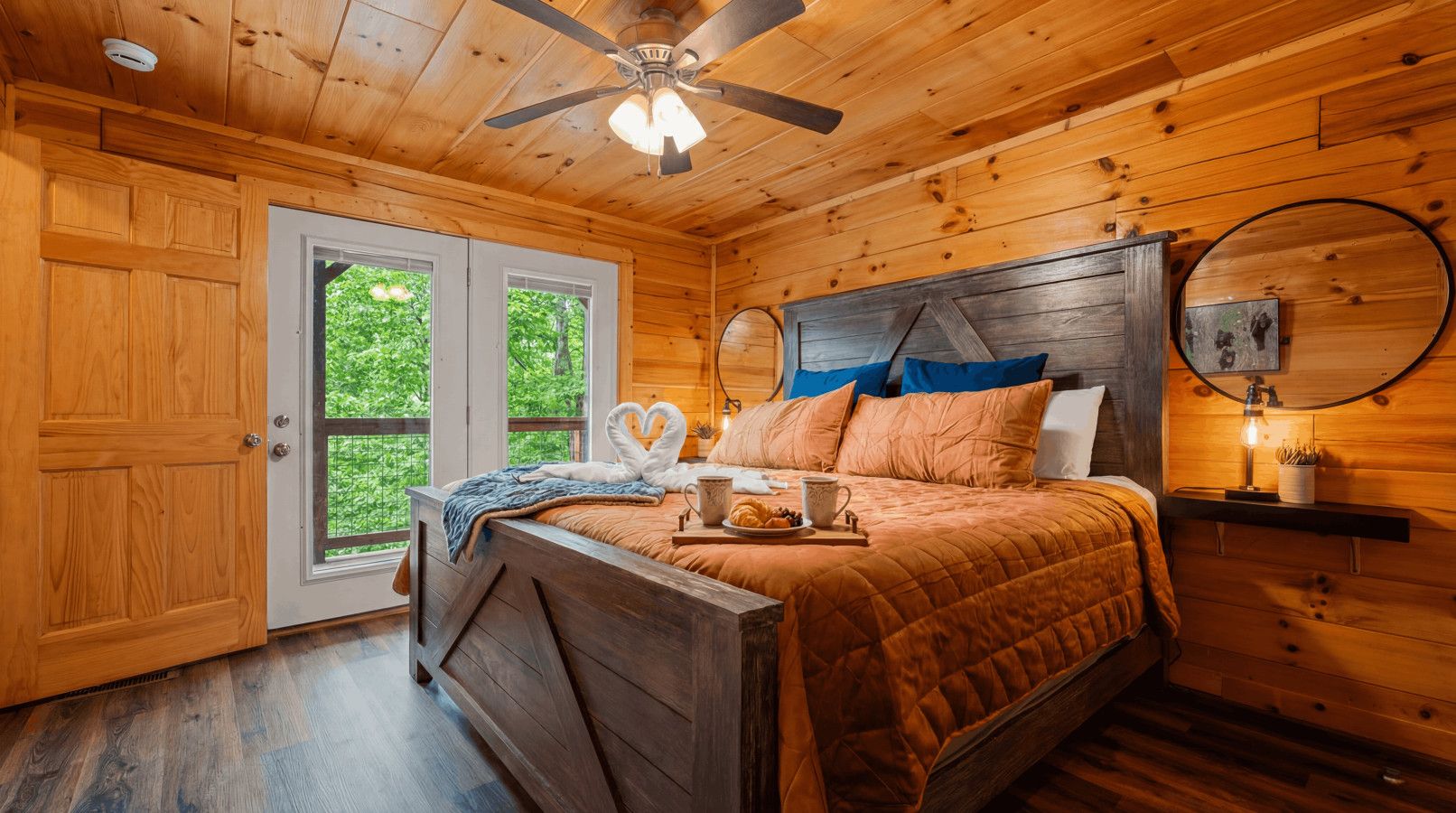 In this cabin, enjoy the privacy of two spacious master bedrooms, each with a luxurious king-size bed.