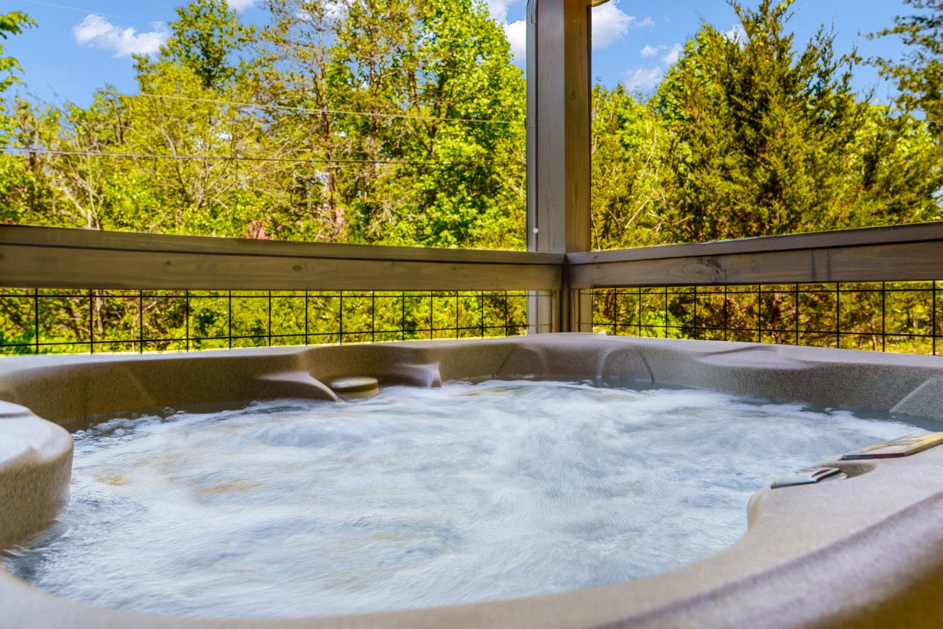 Relax in your private hot tub surrounded by nature.