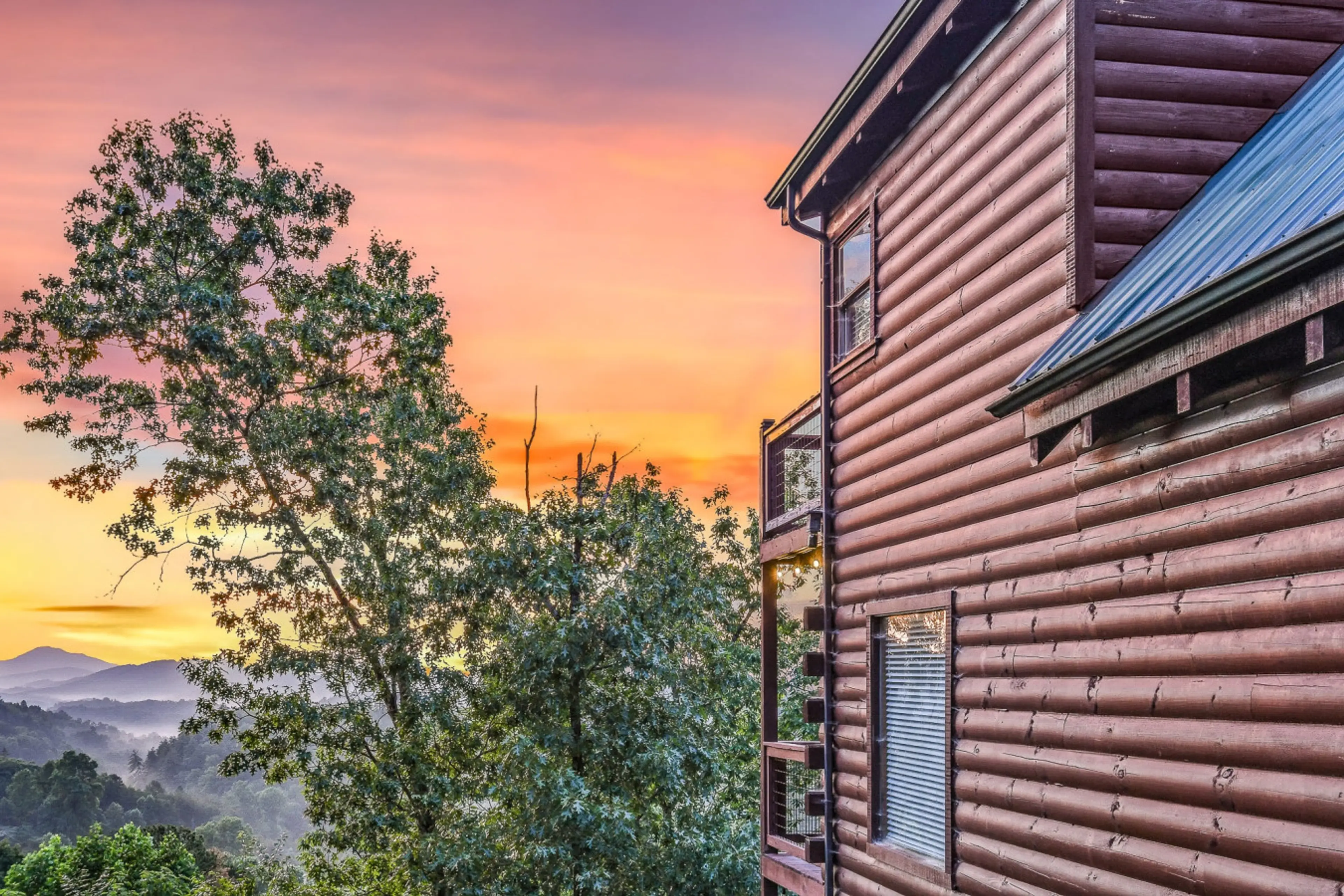 In this cabin, the Smoky Mountains steal the show—framed by breathtaking views and timeless lodge design.
