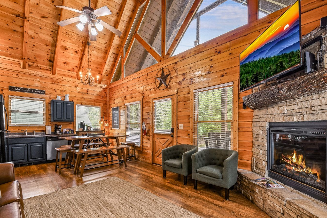A spacious, light-filled living room with elegant finishes and a cozy fireplace.
