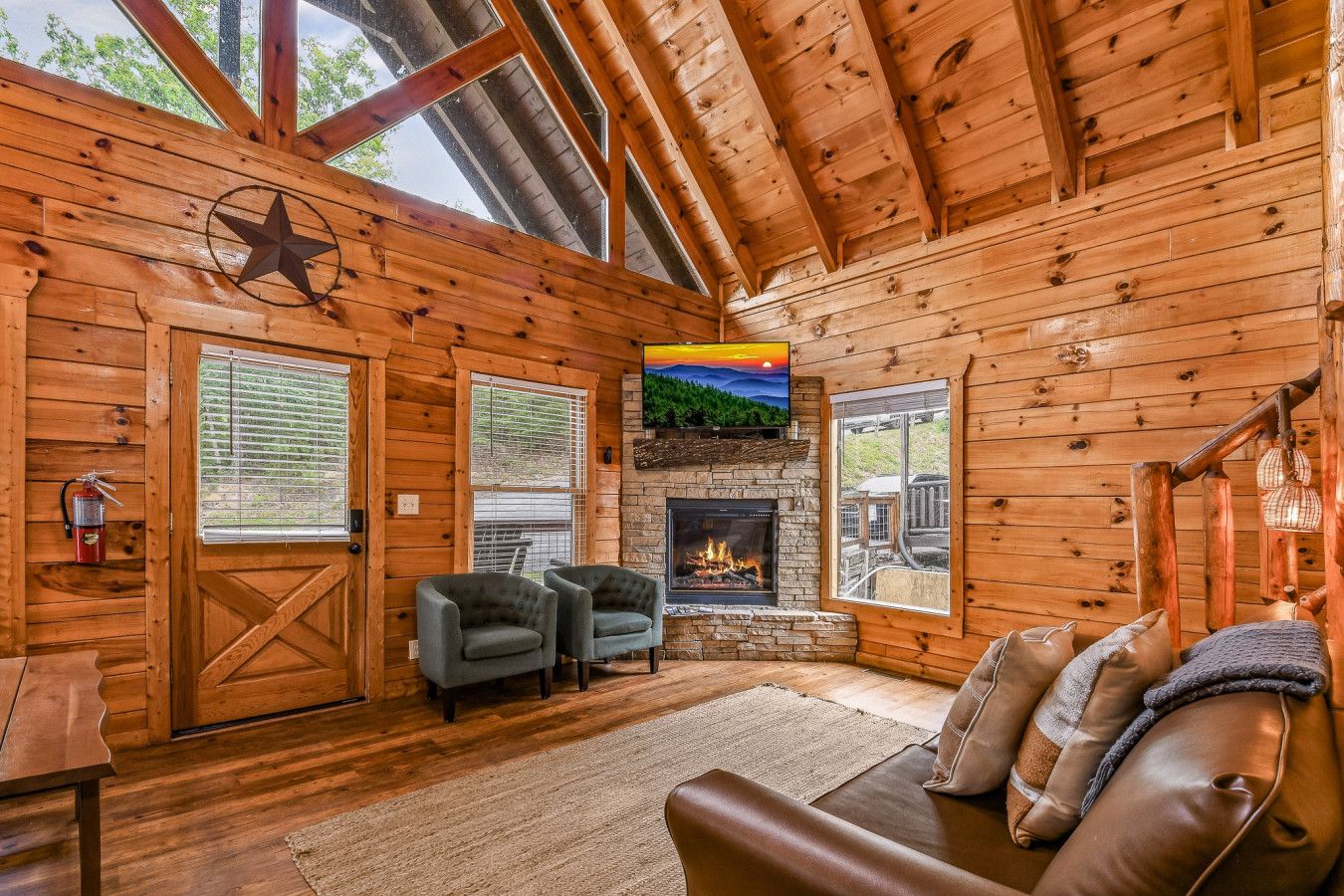 Floor-to-ceiling windows and refined design create a warm, inviting atmosphere.