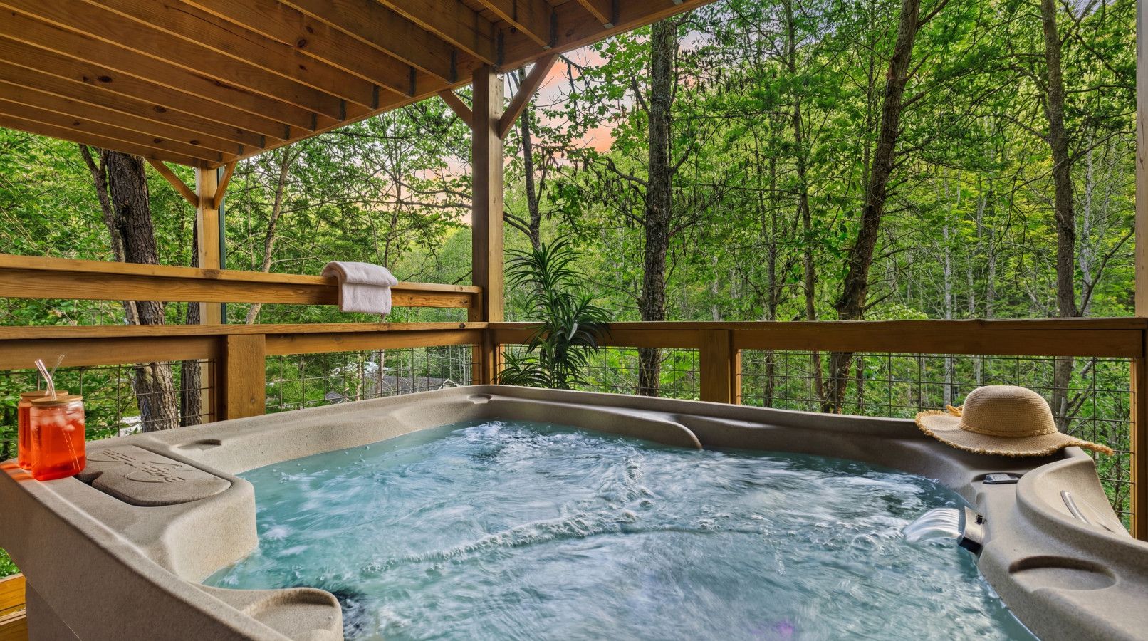 In this cabin relax in the hot tub surrounded by peaceful forest views.