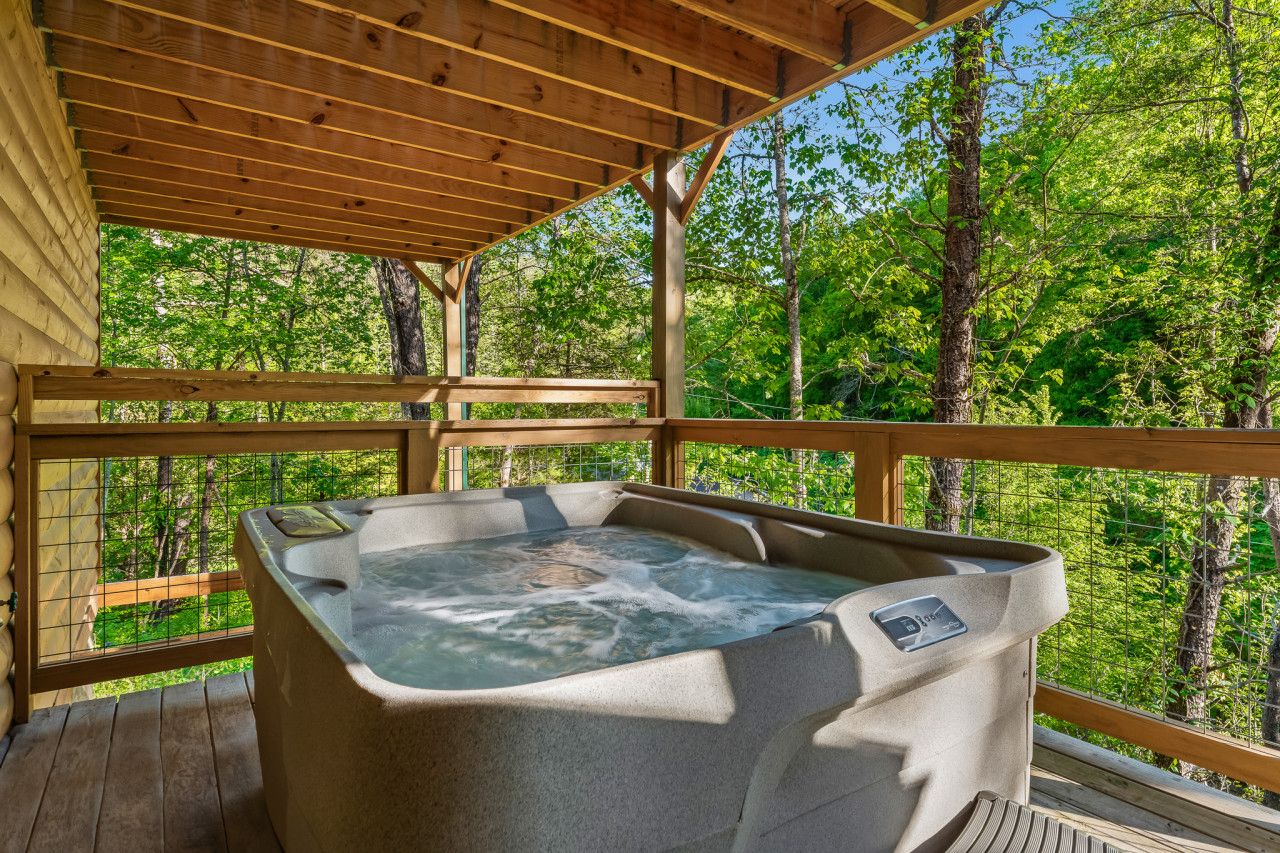 In this cabin, enjoy privacy with a hot tub after a day of adventure in the Smoky Mountains.