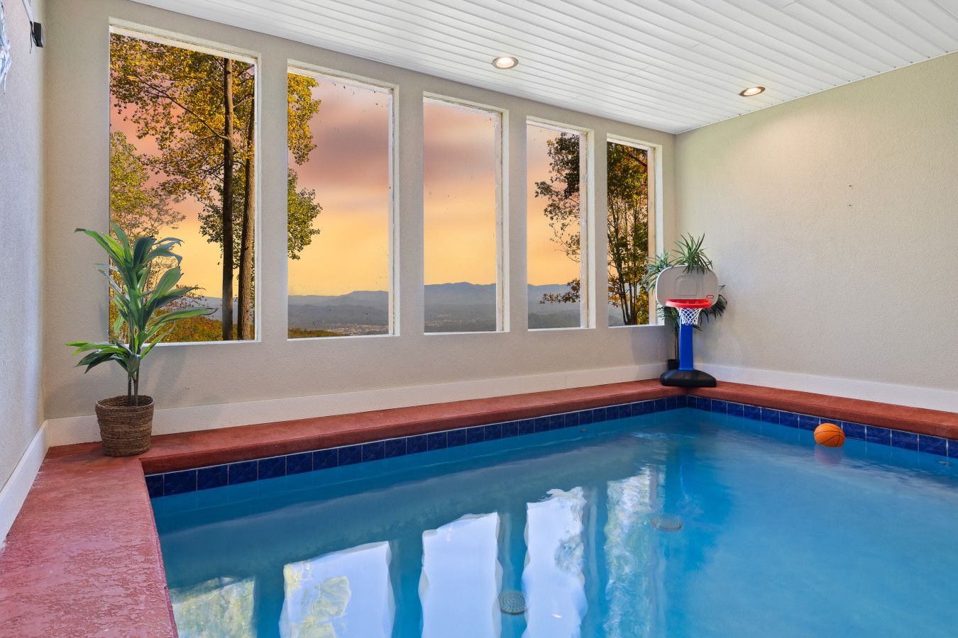 Soak in the luxury of your private heated pool with breathtaking mountain views. Total privacy and poolside games make this cabin the perfect escape.