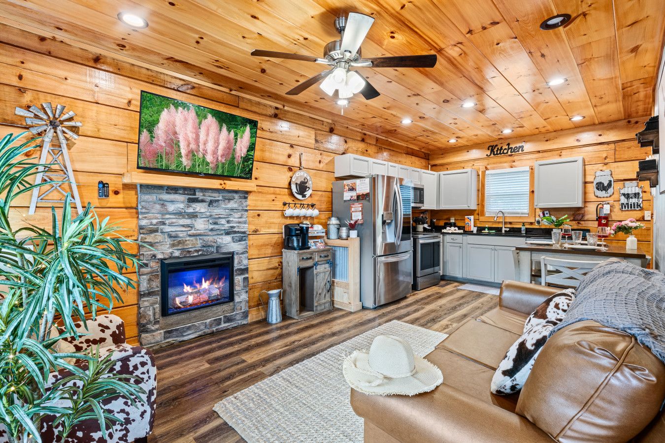 Relax in style—this open-concept living room blends warmth, elegance, and modern luxury.