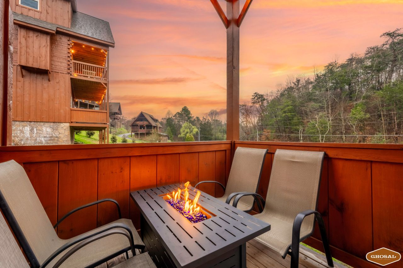 Experience this cabin’s deck: warm flames, golden skies, pure tranquility.
