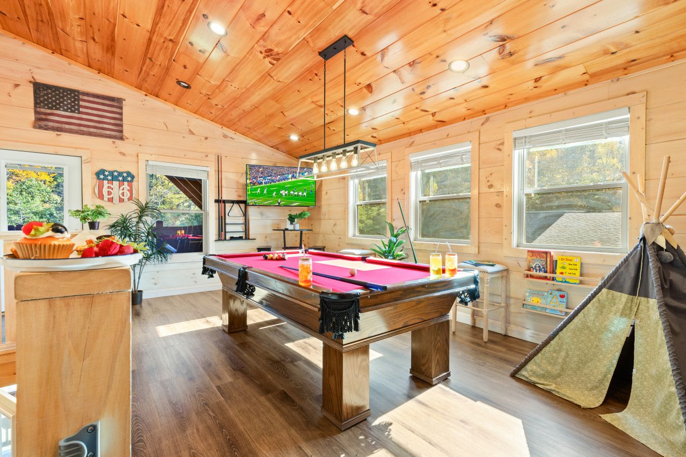 From pool games to football games, this cabin has your perfect playtime covered.