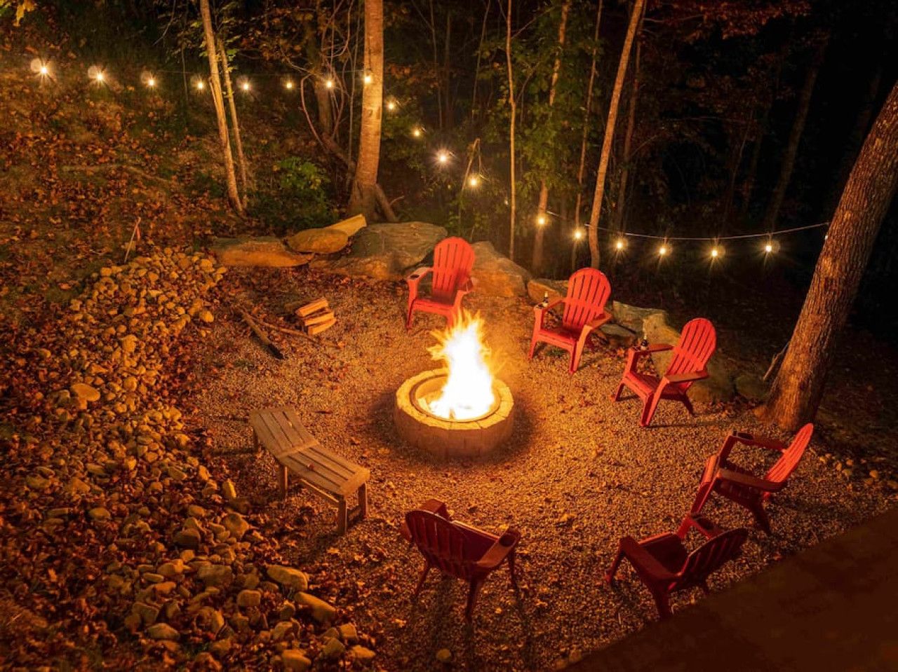 Imagine yourself in this cabin, cozy around the firepit, roasting marshmallows with loved ones.