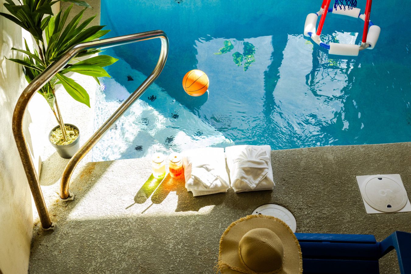 A cool drink, warm light, and endless poolside memories.