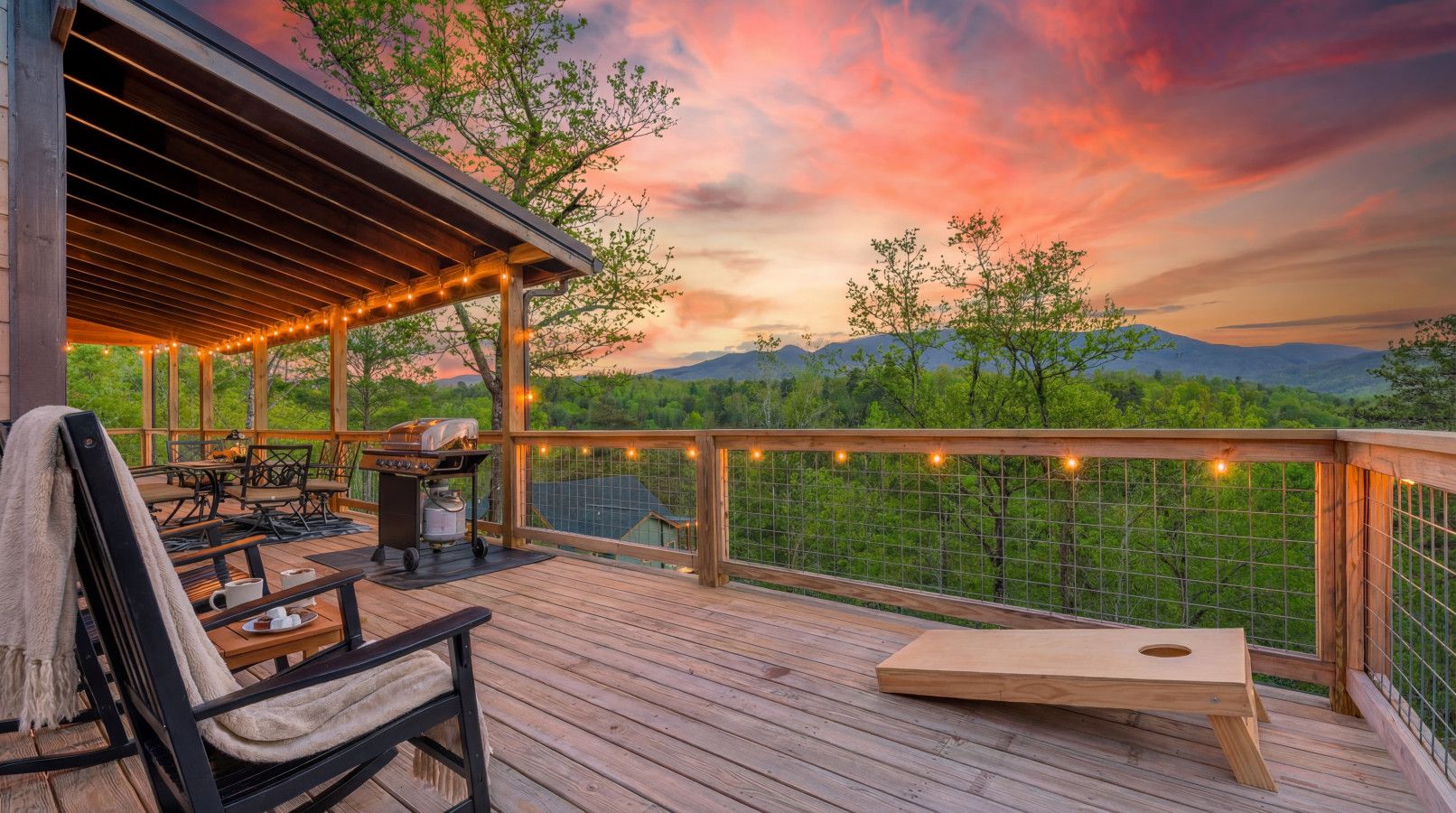 In this cabin, the expansive private deck becomes your front-row seat to the Smoky Mountains.