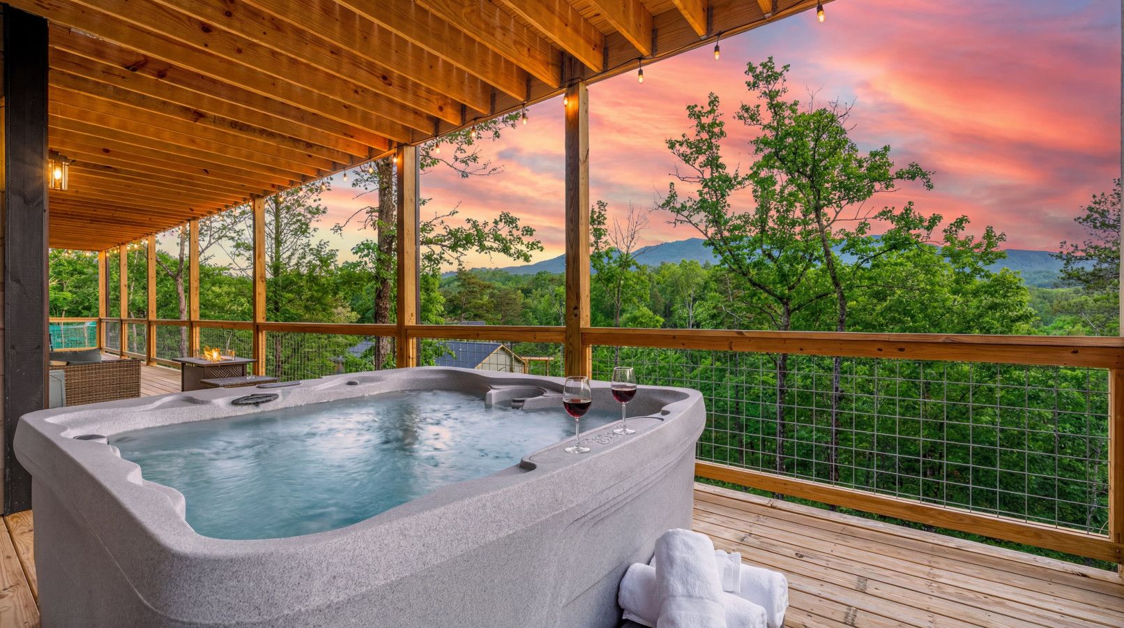 Evenings are better here—bubbling water, private deck, and breathtaking views.