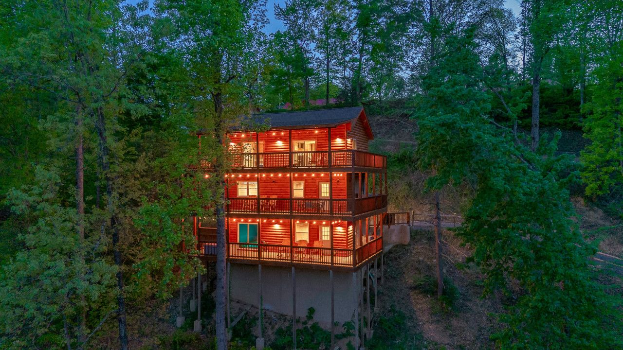 Experience this cabin’s enchanting nighttime glow—an escape in the heart of the forest, just moments from Gatlinburg and Dollywood.