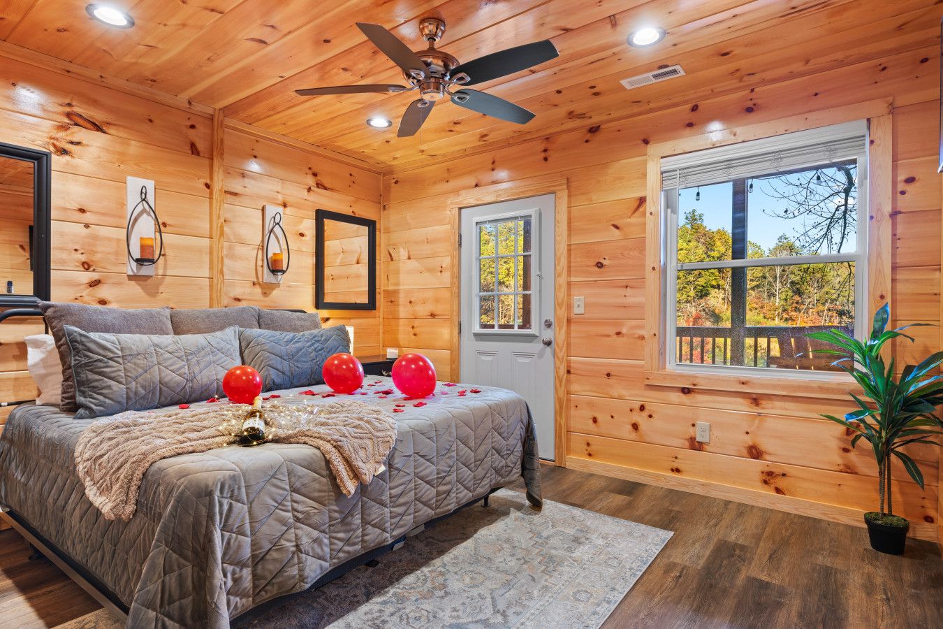 Spacious master suite with private deck access and your own hot tub just steps away.