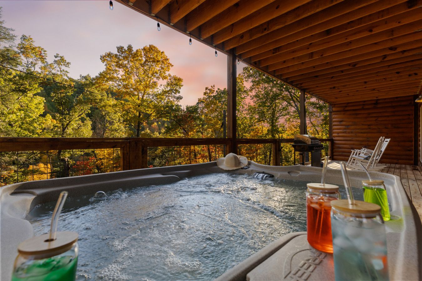 Unwind in this cabin’s private hot tub—cocktail in hand, sunset on the horizon, pure bliss.