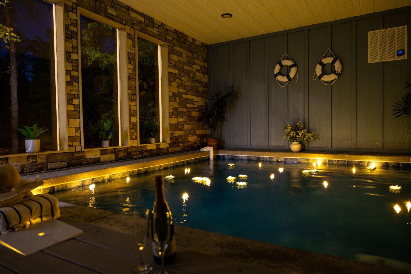 Poolside nights done right—grab a glass, dip your toes, and unwind.