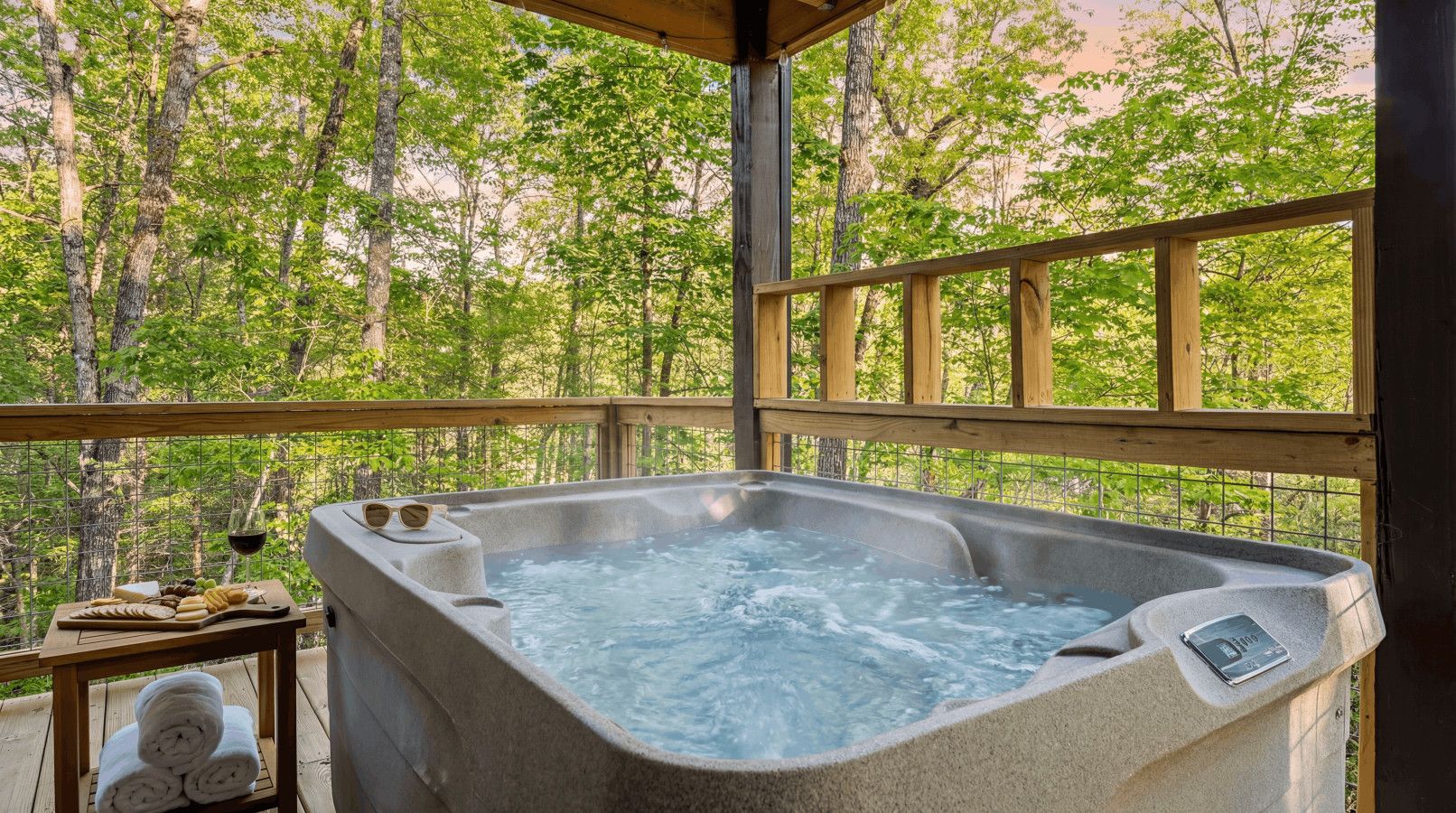 Wine in hand, mountains all around.