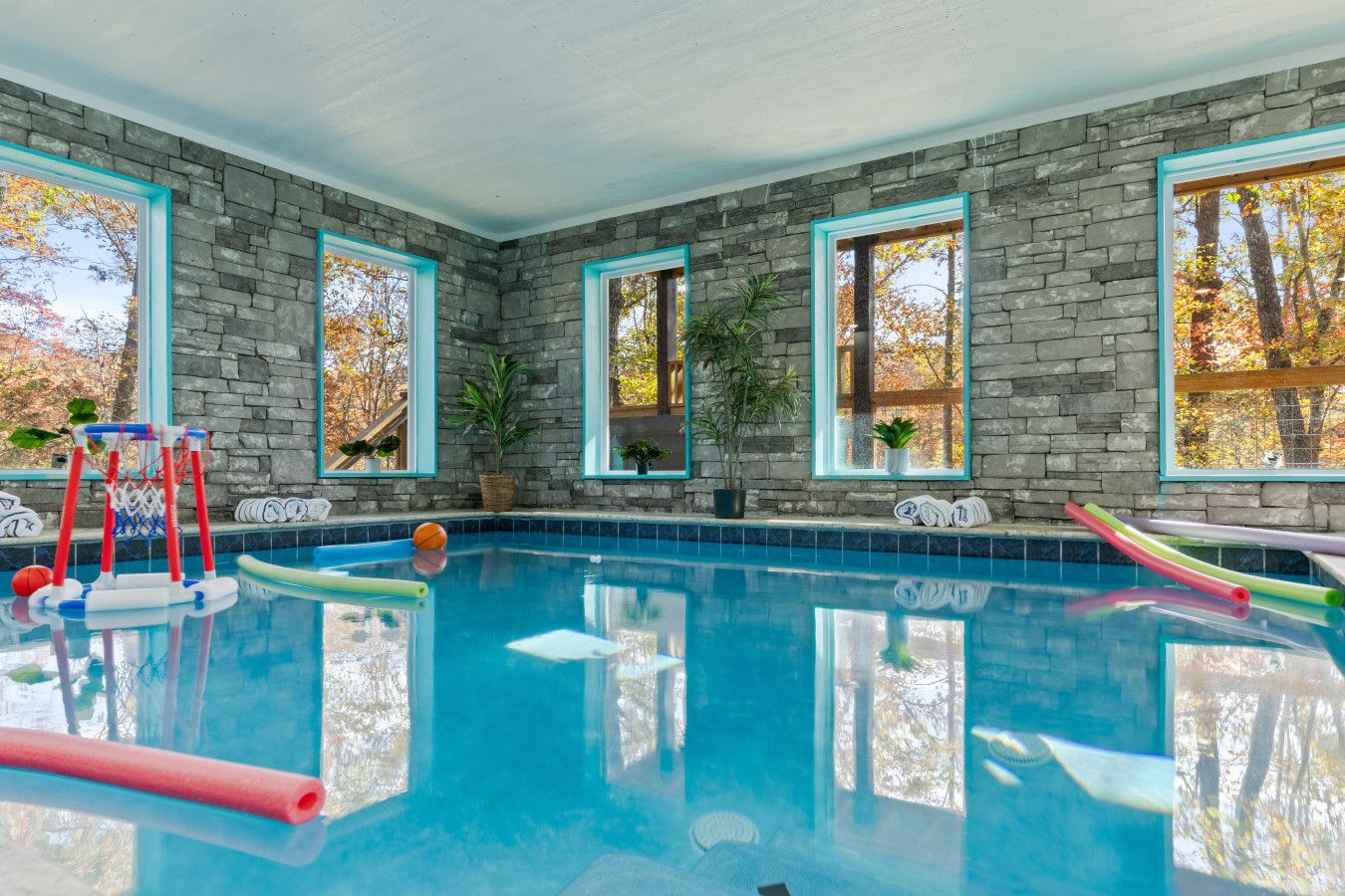 This cabin offers the largest and most stunning private, heated indoor pool—perfect for groups to enjoy year-round.