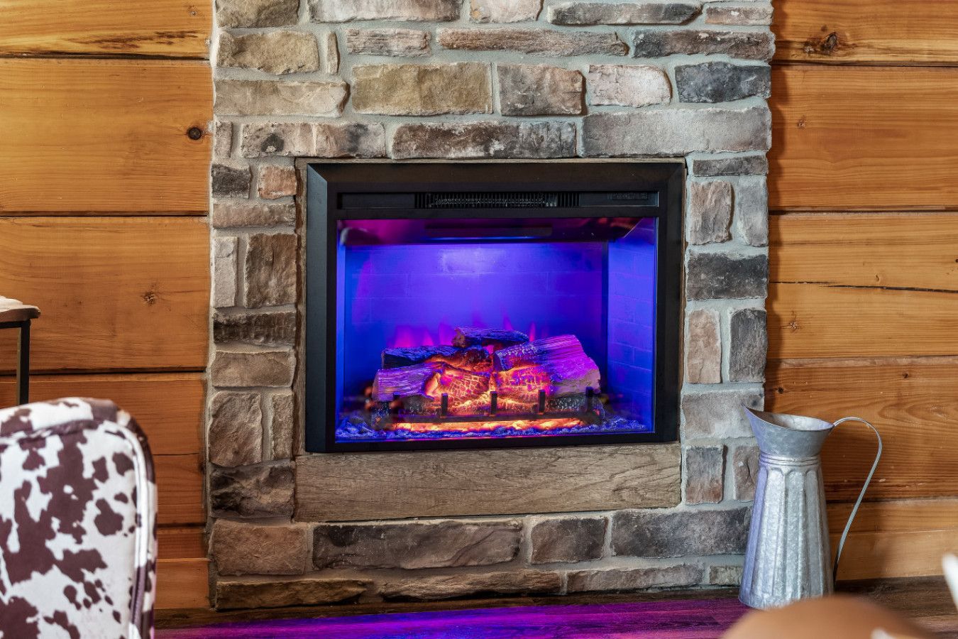 A romantic escape starts with a crackling fireplace.