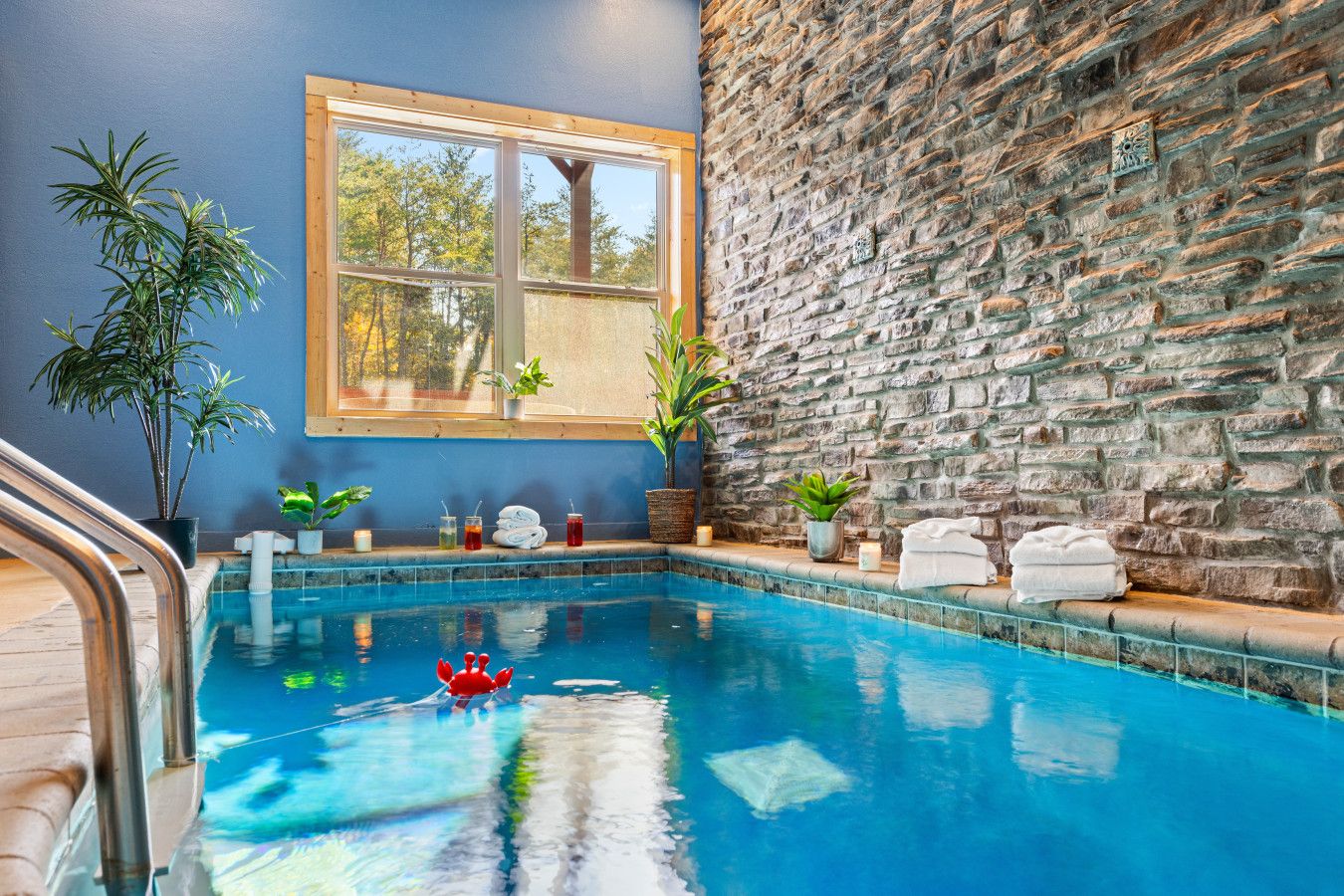 Indulge in pure luxury with this cabin’s heated indoor pool, perfect for a romantic escape.