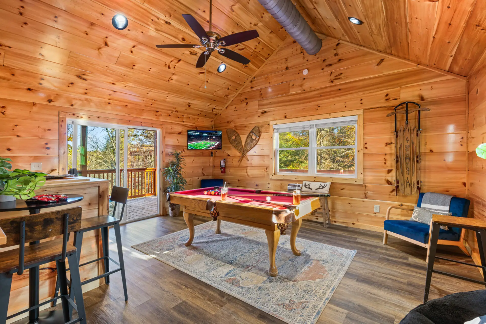 Unwind with a glass of wine and a friendly game of pool in this spacious entertainment area.