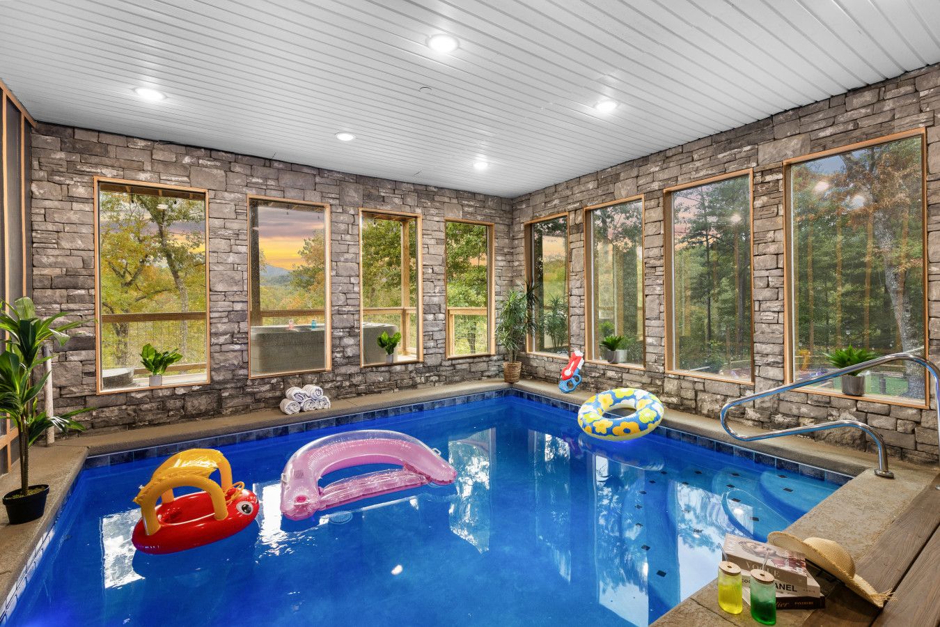 Dive into luxury with two massive indoor heated pools, offering stunning views and endless fun with a variety of games for everyone.