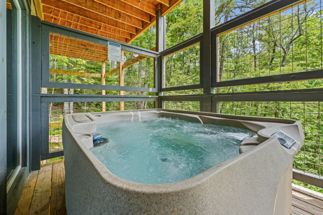 Relax in the hot tub and take in the fresh air.