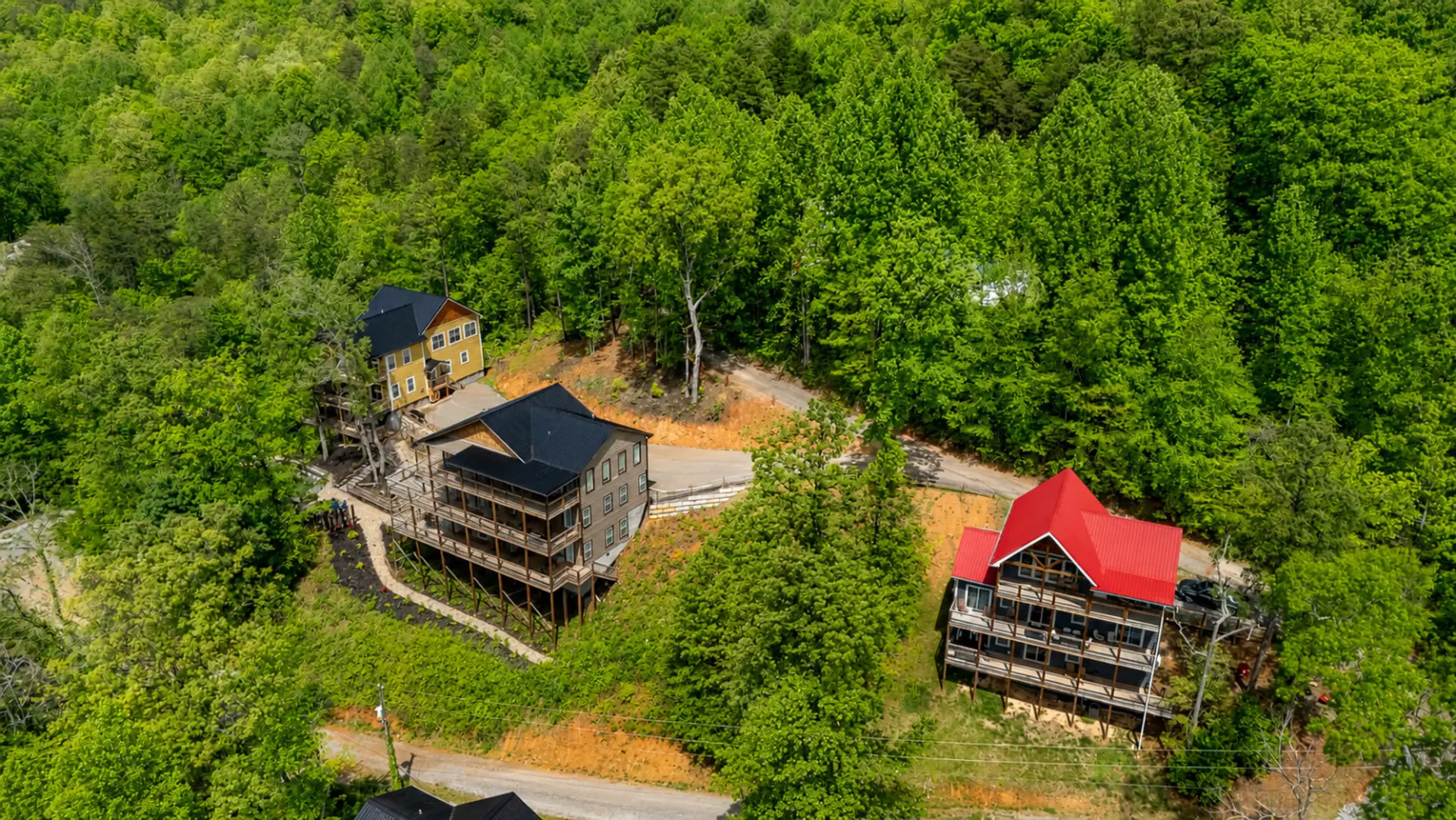 Luxury multi-cabin retreat with private pools, theaters, game rooms, mountain views, and space designed for unforgettable group stays.