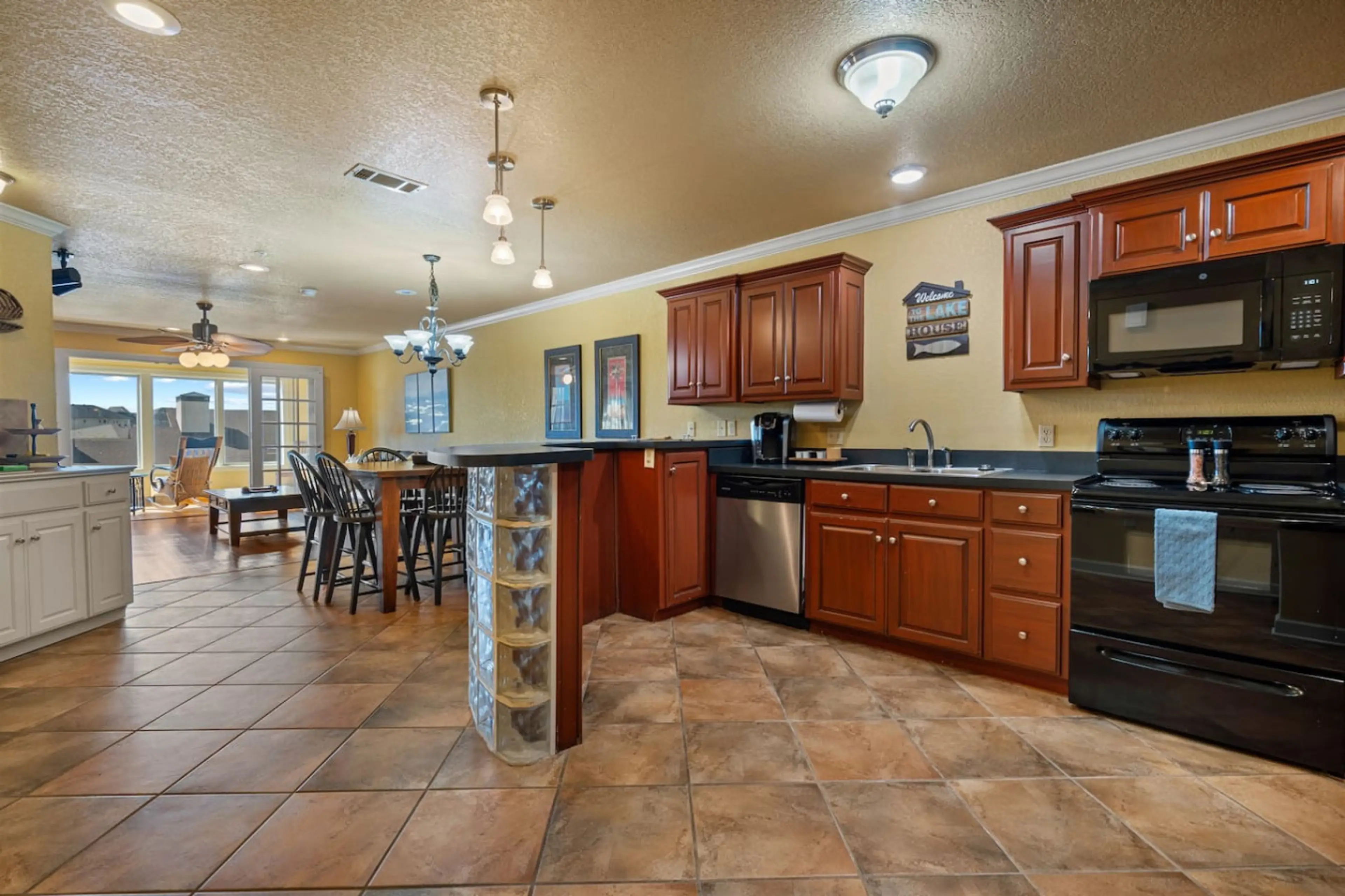 The Kitchen is Fully Stocked and Open to the Dining and Living Space!