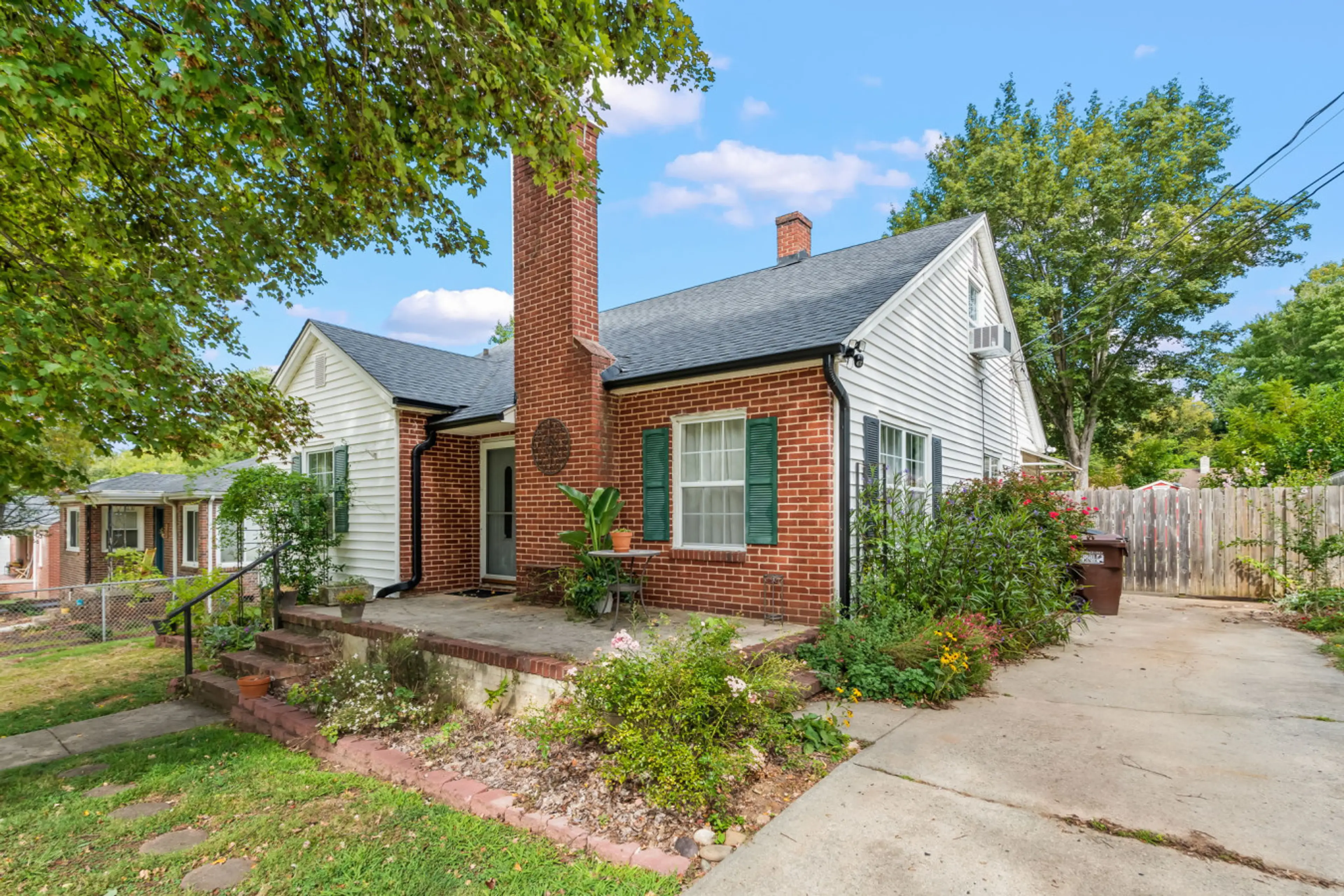 Front of house with private driveway to the right.