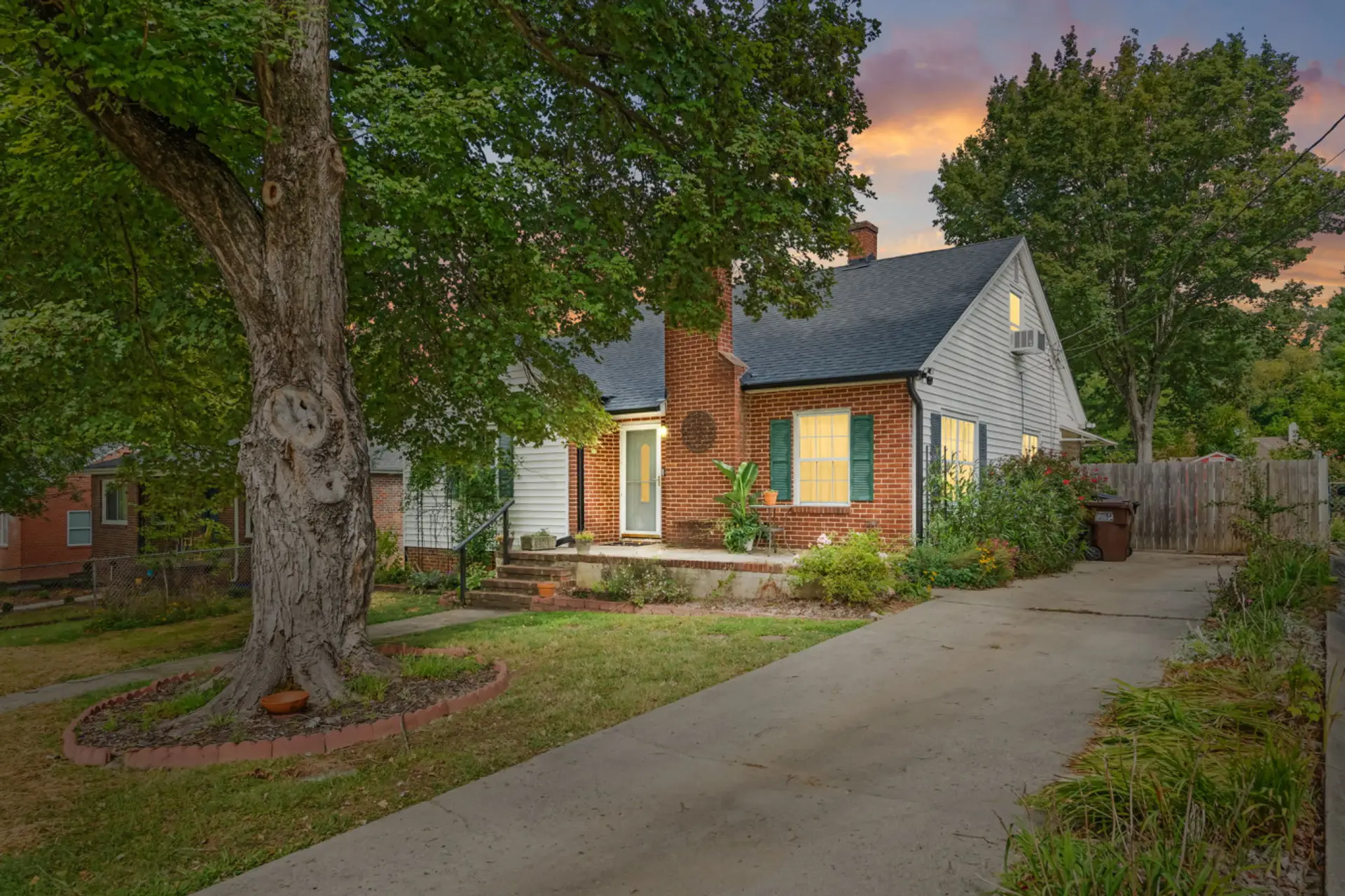 Front of house with private driveway to the right.