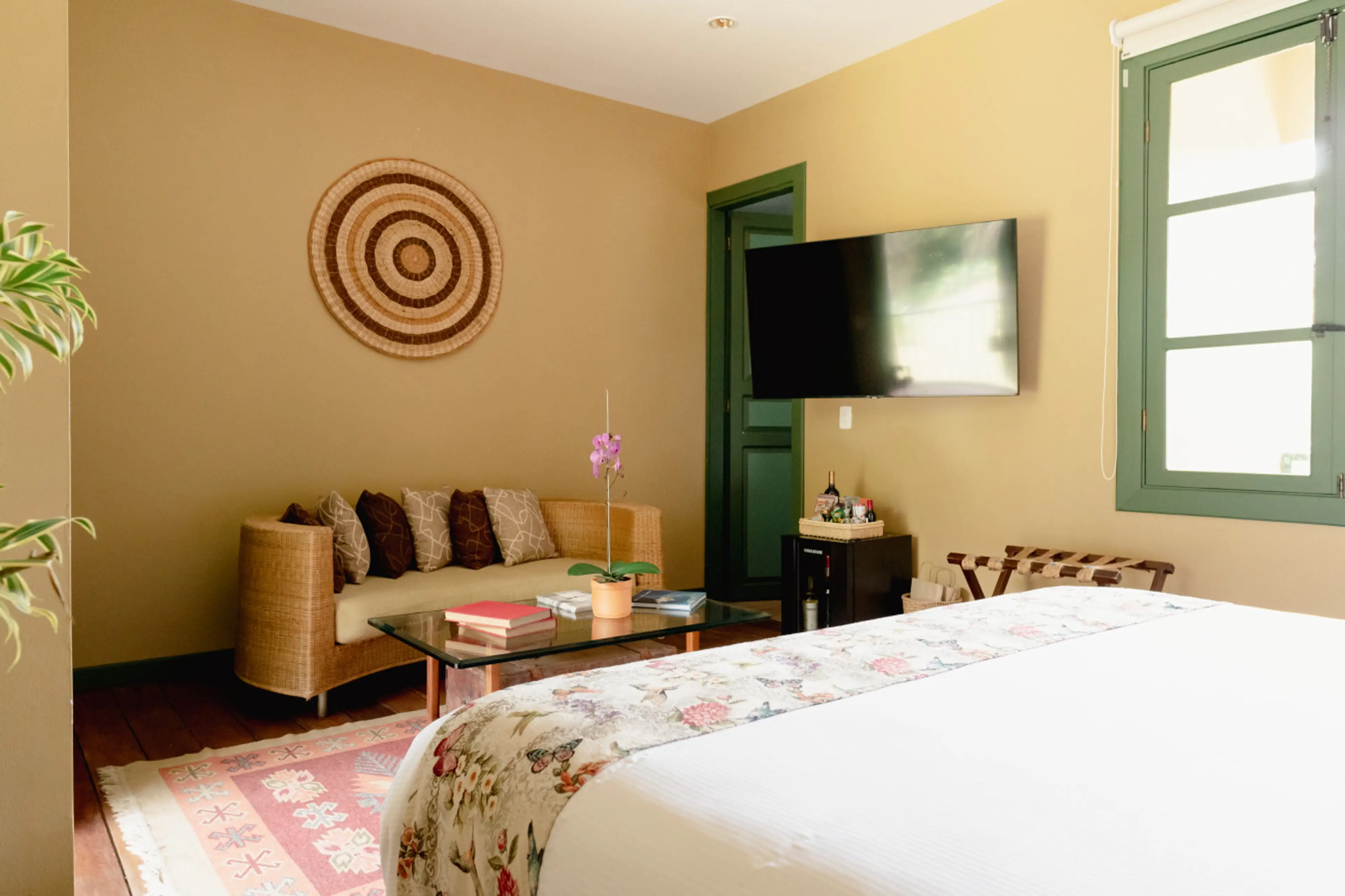 Bedroom - Embrace tranquility in this sun-drenched haven, where earthy tones and elegant decor set the perfect mood for relaxation. Enjoy your morning coffee on the patio, surrounded by lush greenery, or unwind in the plush comfort of our inviting bedro