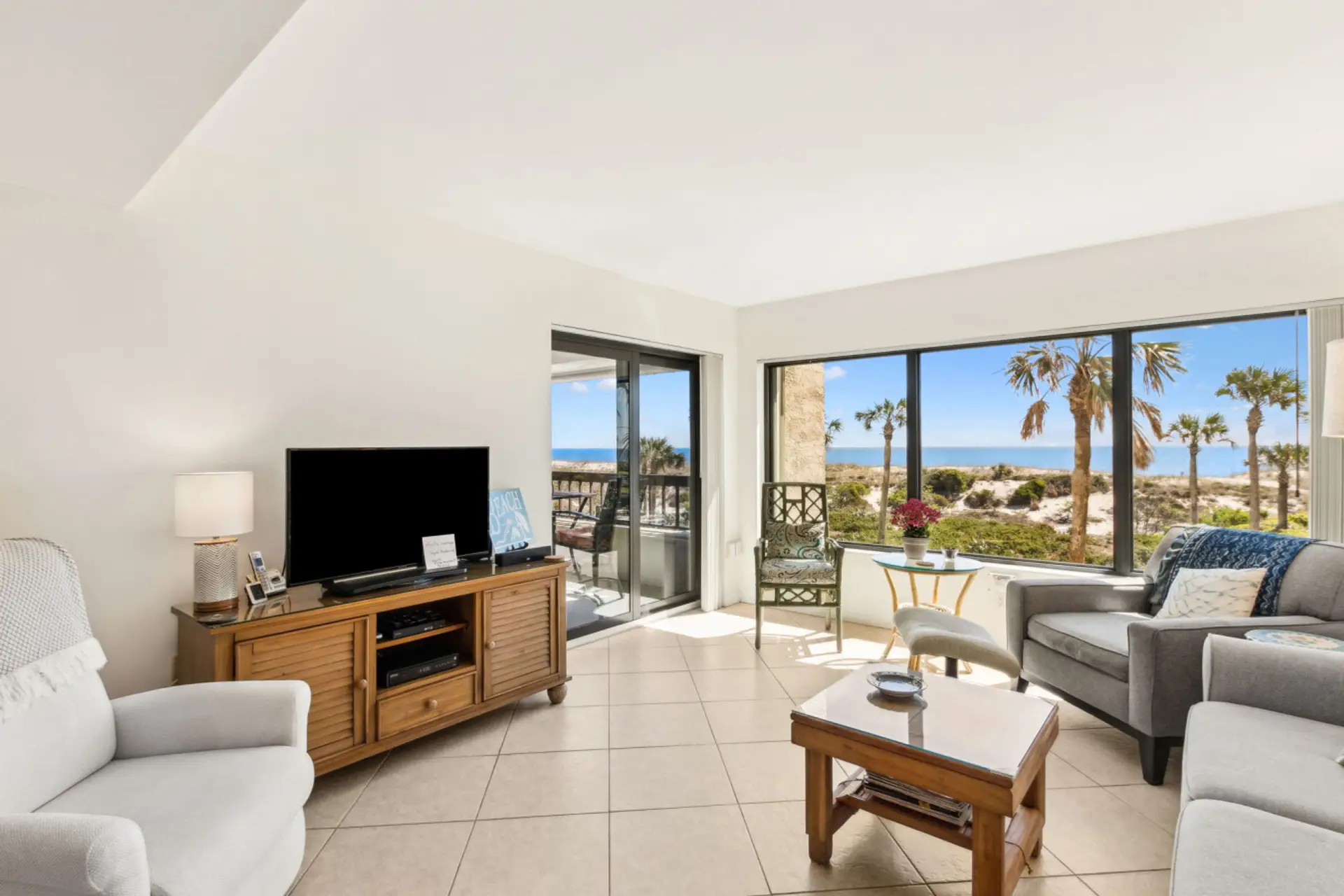 Living room with cable tv and ocean view