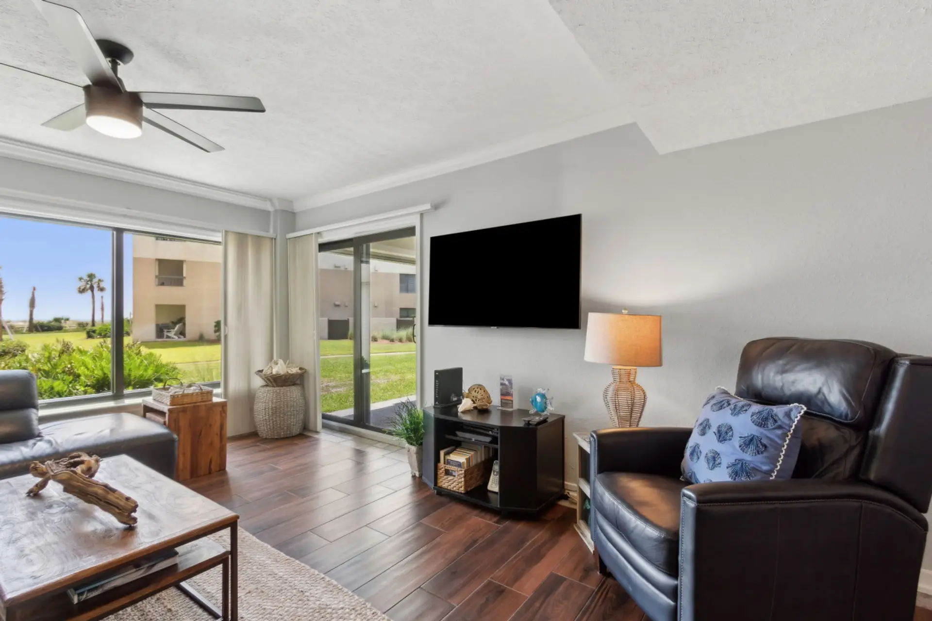 Living room with sliding glass door to patio