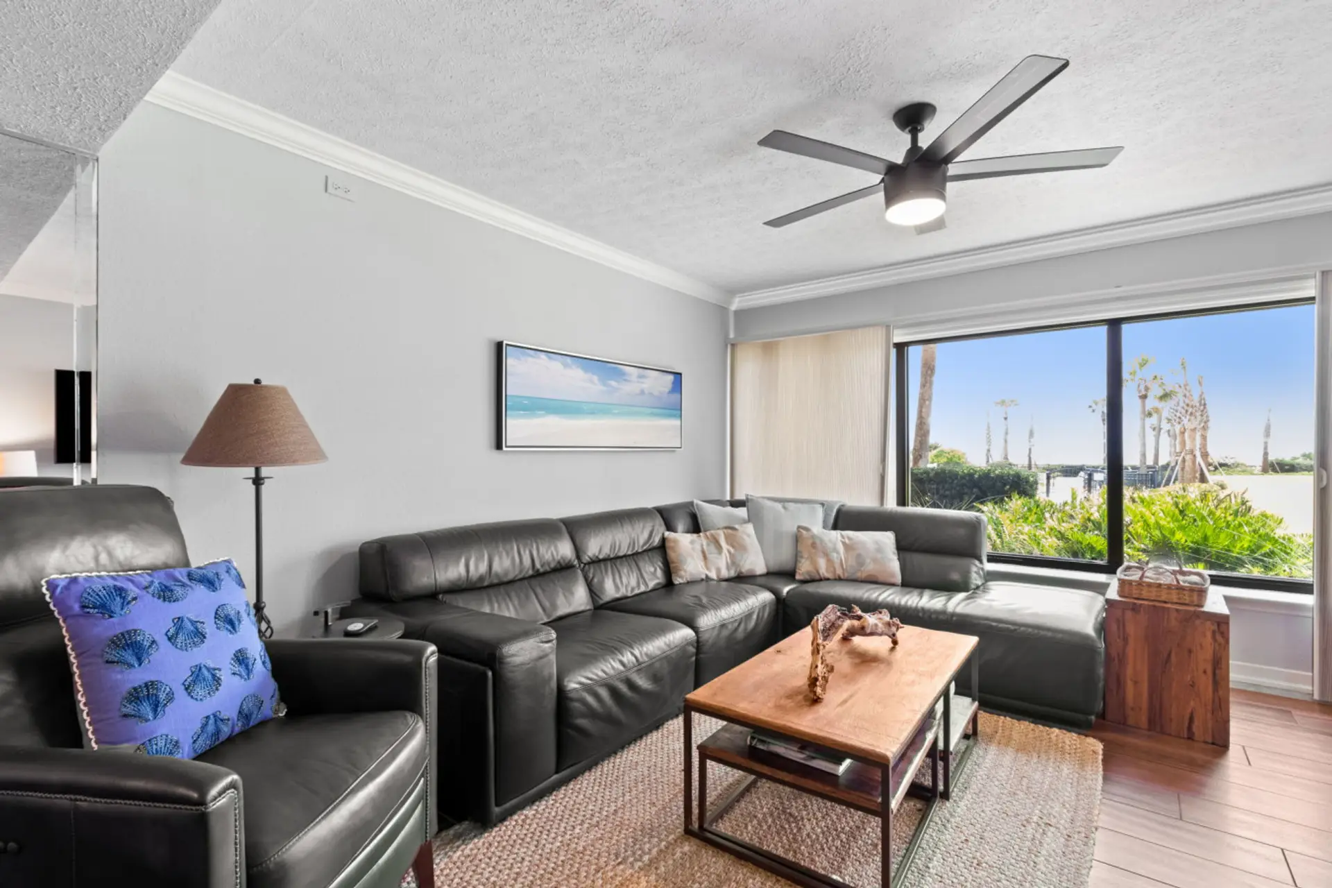 Living room with cable tv and lots of natural lighting