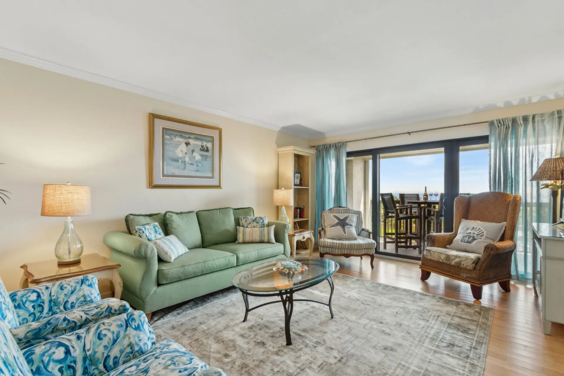 Living room with sliding glass door to balcony