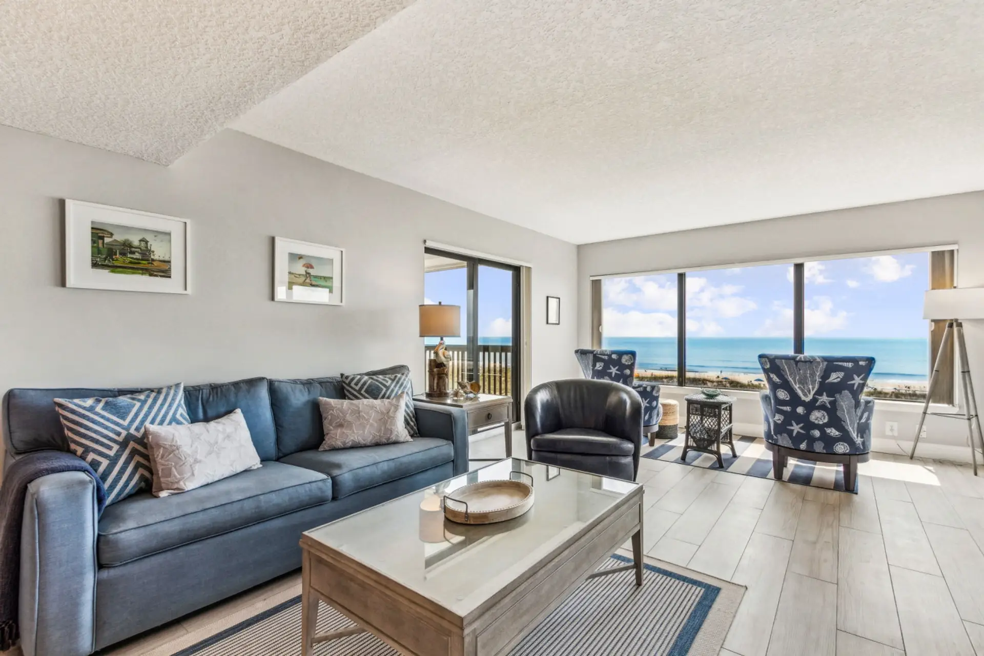 Living room with ocean view and covered balcony