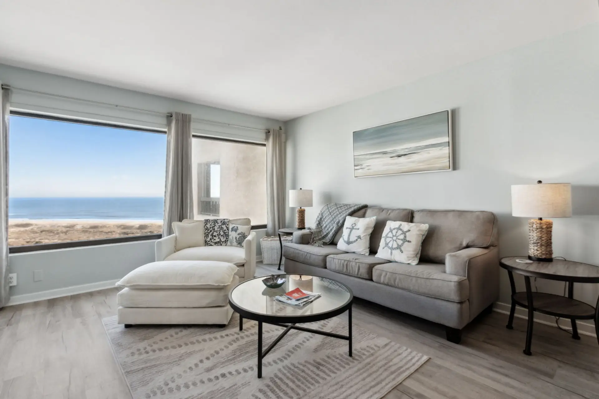 Living room with cable tv and access to covered balcony