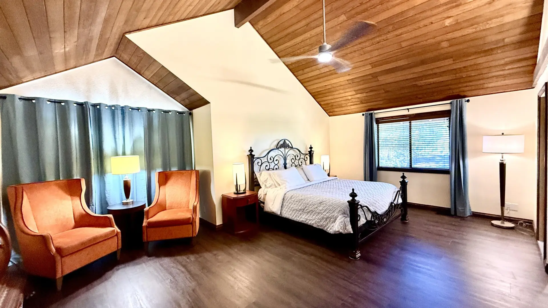 Huge master bedroom with comfy King bed and private sitting area.
