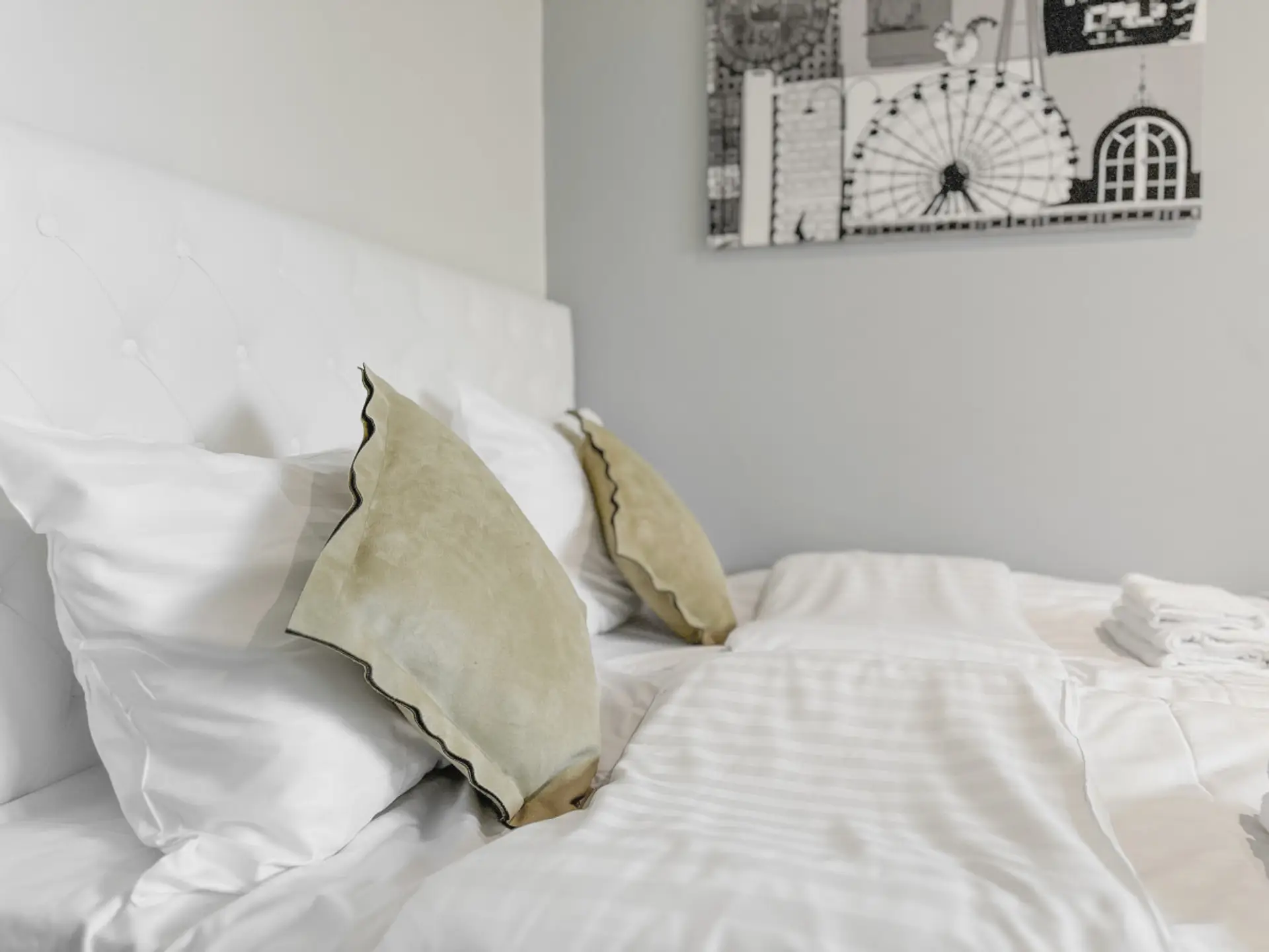 In 2024 we added a beautiful headboard behind the beds